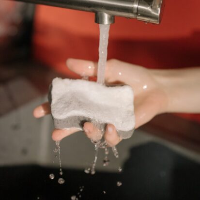 Wet sponge ready for cleaning granite