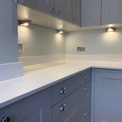 Unique kitchen cabinets under white quartz