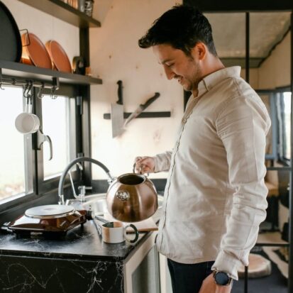 man happy with his cheap quartz worktop