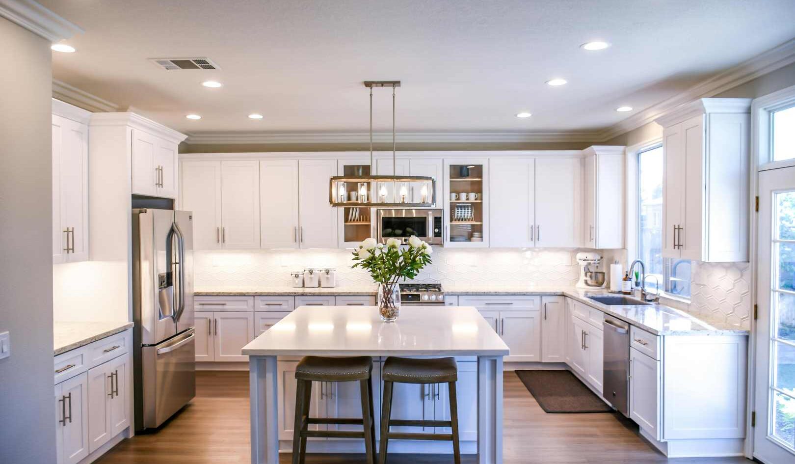 Granite kitchen island with stools - traditional kitchen setting