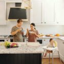 Marble kitchen island - family enjoying their dinner by the worktop