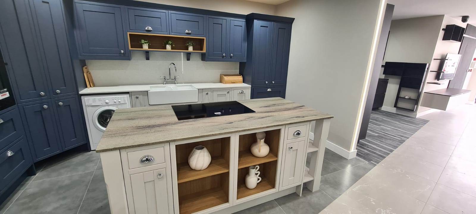 granite and quartz in one kitchen - contrast with blue cabinets
