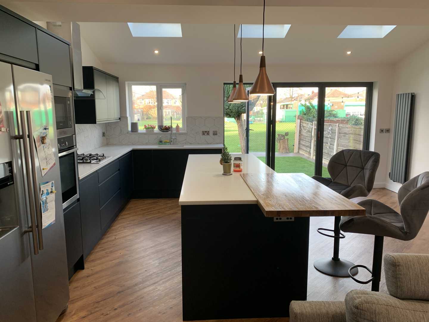 white quartz worktops plus breakfast bar from wood worktop